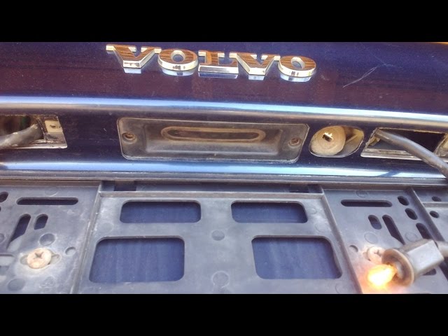 Volvo S80. Замена кнопки багажника.