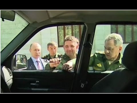 Генерал оторвал ручку у УАЗ «Патриот», показывая Путину новую технику