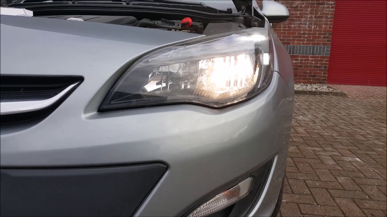 Как поменять лампу ближнего света на Opel Astra J